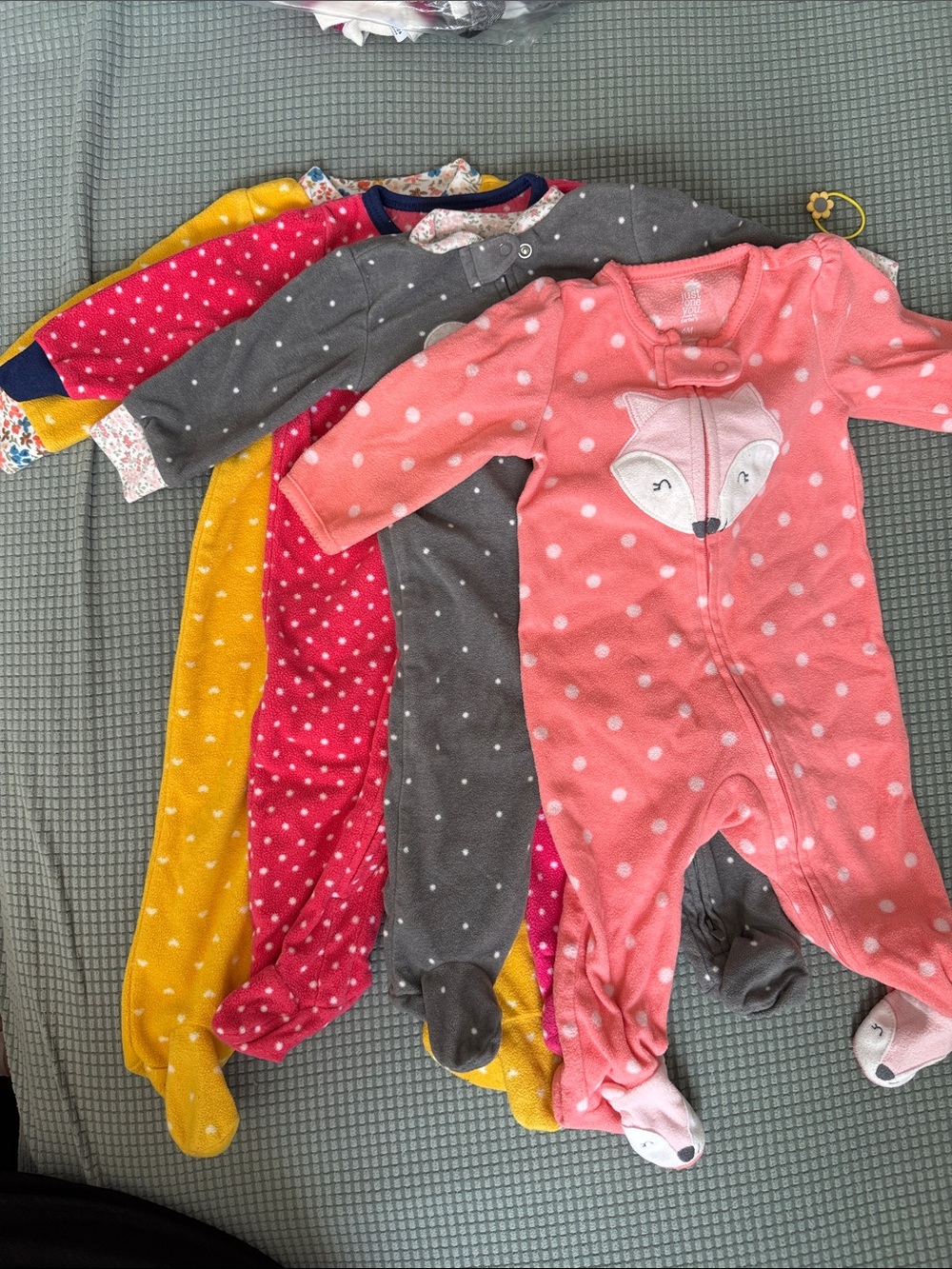 Baby Girls' 4 One-Piece Footed onesie size 6-9M.
